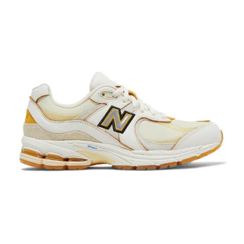 ניו באלאנס מדגם New Balance Joe Freshgoods x 2002R Conversations Amongst Us הן נעלי סניקרס עבור נשים , גברים וילדים