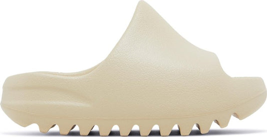 נעלי סניקרס Yeezy Slides Kids 'Bone' 2022 של המותג אדידס בצבע לבן עשויות קצף מסוג EVA (פולימר)
