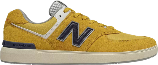 נעלי סניקרס All Coasts 574 'Sunflower' של המותג ניו באלאנס בצבע צהוב עשויות טֶקסטִיל